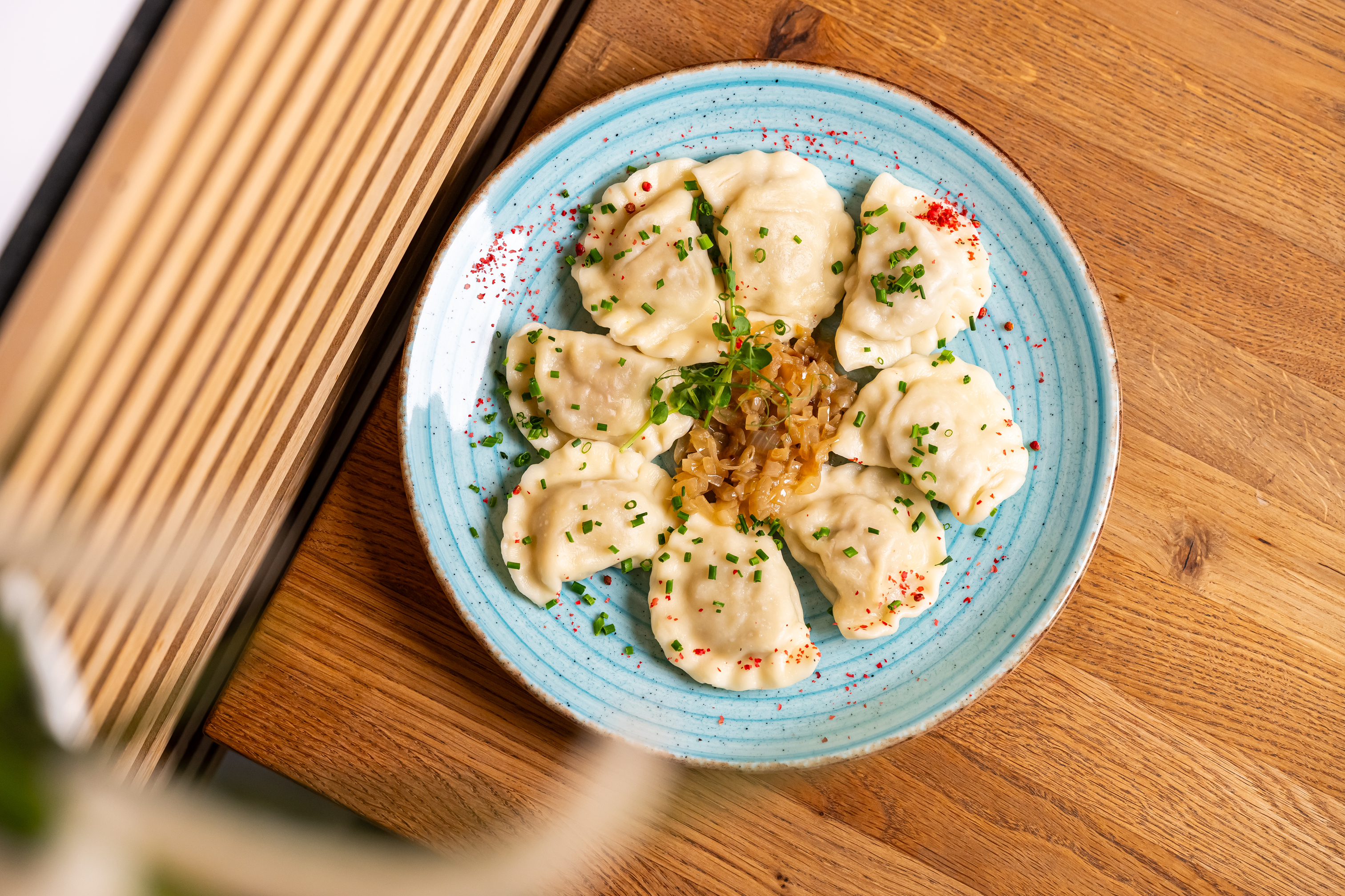 Dumplings fried in butter with onion - various fillings
